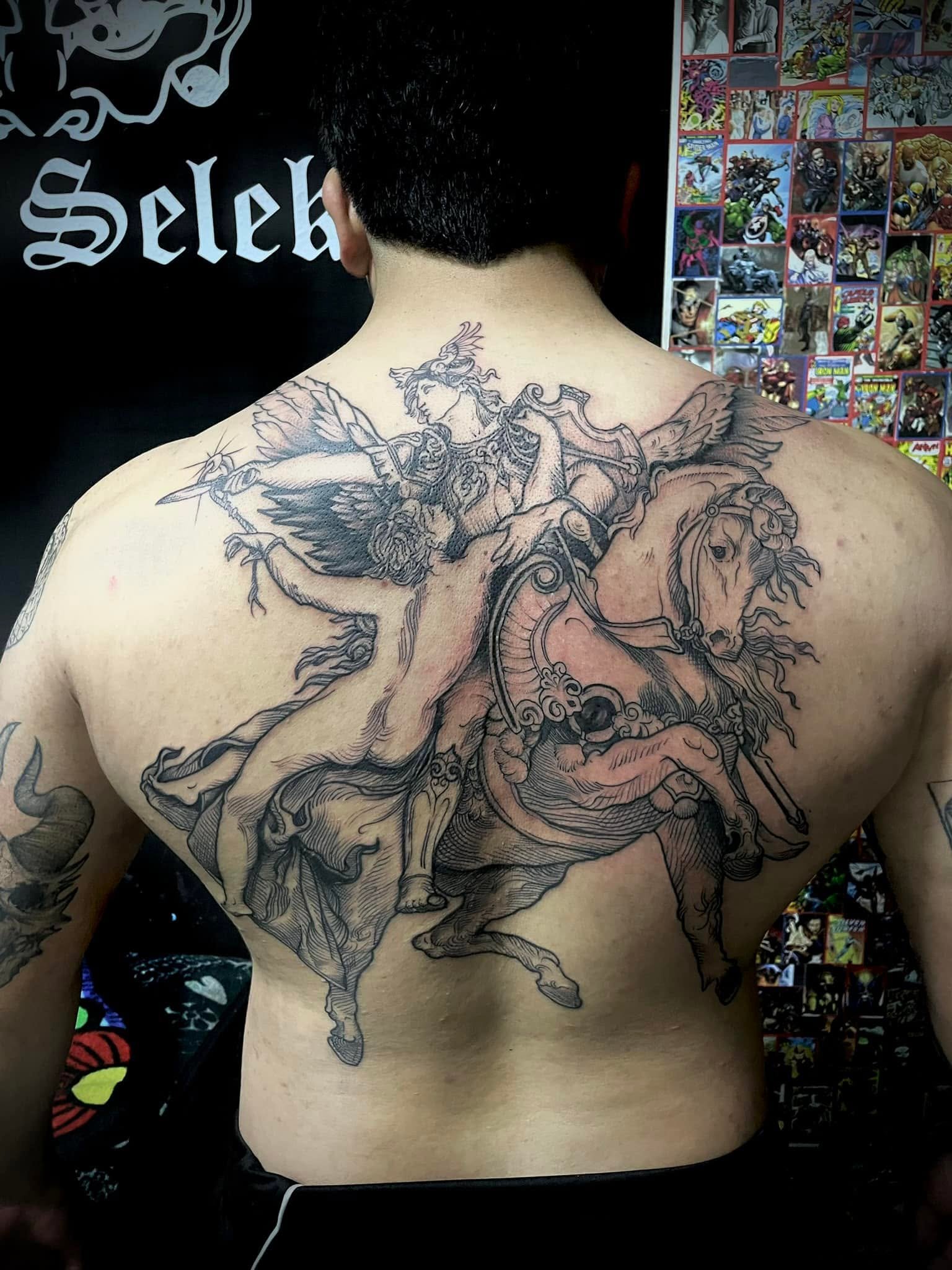 Tatuaje gran formato en espalda